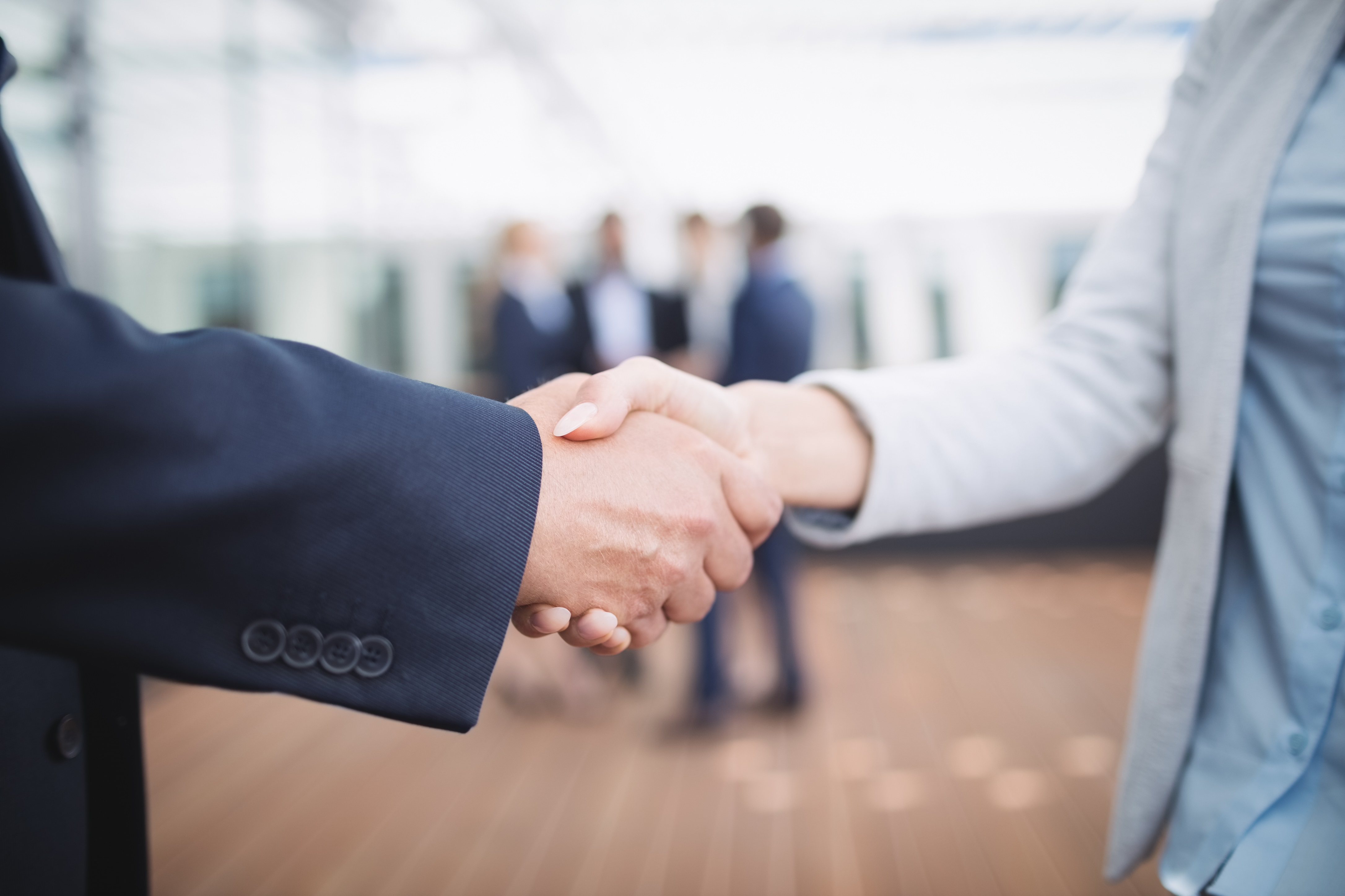 businesspeople-shaking-hands